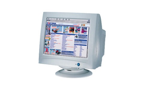 An older computer monitor displaying the Sport-Thieme online shop with products and categories on the screen.