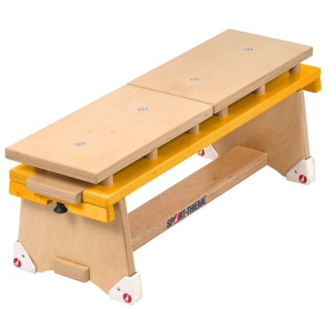 A wooden bench with two legs and a yellow top.